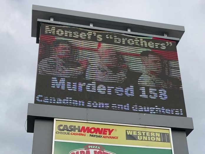 An electronic sign on Lansdowne Street West between Goodfellow Road and The Parkway in Peterborough displays a message associating Peterborough-Kawartha MP Maryam Monsef with the death of 158 Canadian soldiers during Canada's 12-year mission in Afghanistan against the Taliban. Contrary to Elections Canada rules for third-party advertising, there is no tagline indicating who authorized the advertisement. (Photo: kawarthaNOW)