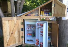 The new community fridge, currently installed in front of a private residence at 225 Dublin Street in downtown Nogojiwanong-Peterborough, includes a refrigerator for fresh food and a pantry for non-perishables, menstruation products, pet food, personal protective equipment, and more. (Photo courtesy of Community Fridge Ptbo)