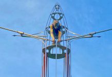 A detail of 'Dead Reckoning', a sculpture by renowned Canadian artist David Robinson that depicts a muscular rower in a stylized scull pulling at his oars. The sculpture, installed next to the Trent Atheltics Centre at Trent University, is clearly visible both to passersby and to rowers on the Otonabee River. (Photo: David Robinson Sculpture @robinsonstudiogallery / Instagram)