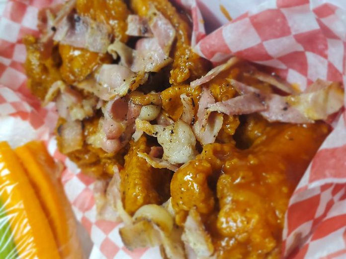 Boss Wings, which can be topped with a variety of delicious toppings, can be ordered online and delivered to your door. (Photo: Boss Wings)