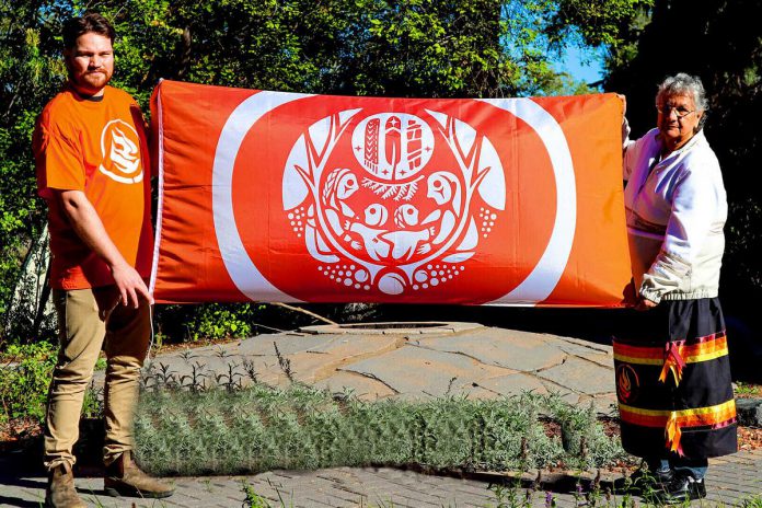 The National Centre for Truth and Reconciliation at the University of Manitoba in Winnipeg unveiled a Survivors' Flag to mark the first official National Day of Truth and Reconciliation on September 30, 2021. The flag was developed in collaboration with residential school survivors from Inuit, Mi'kmaq, Atikamekw, Cree, Ojibway, Dakota, Mohawk, Dene, Nuu-chah-nulth, Secwepemc, and Métis communities. (Photo: National Centre for Truth and Reconciliation)