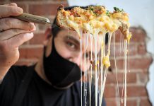 Taso Hatzianastasiou, owner and operator of Taso's Restaurant and Pizzeria, shows off a Chicago-style deep dish mac 'n' cheese. Taso is one of 18 downtown Peterborough restaurants participating in the first-ever Mac + Cheese Festival during October. (Photo: Peterborough Downtown Business Improvement Area)