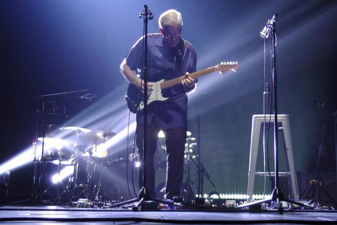 After two postponements due to the pandemic, it looks like Bruce Cockburn will finally be performing again at Showplace Performance Centre in downtown Peterborough now that the Ontario government has lifted capacity restrictions for performance venues. Folk Under The Clock is presenting the legendary Canadian musician (pictured here performing at Showplace on September 25, 2017) on April 19, 2022. (Photo: Bruce Head / kawarthaNOW)