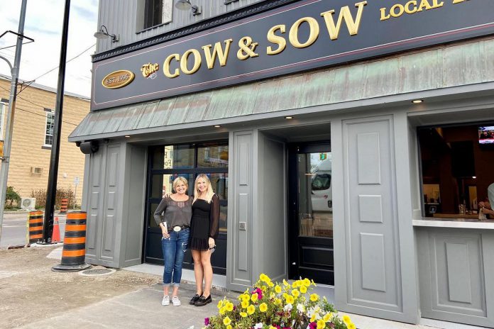 Owners Lorraine and Emily Forbes in front of The Cow and Sow Eatery in Fenelon Falls. The mother-and-daughter team have completed extensive renovations to the popular restaurant and bar and held a trial opening on October 15, 2021, with an official opening coming soon. (Photo: The Cow and Sow Eatery / Facebook)