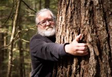 Dr. Peter Quinby, chief scientist with the Peterborough-based non-profit Ancient Forest Exploration & Research, identified the Catchacoma Forest in northern Peterborough County as containing the largest-known stand of old-growth eastern hemlock in Canada. Quinby, along with Katie Krelove of the BC-based non-profit Wilderness Committee and a group of concerned citizens, have been working to protect the old-growth trees from logging. (Photo courtesy of Mitch Bowmile)