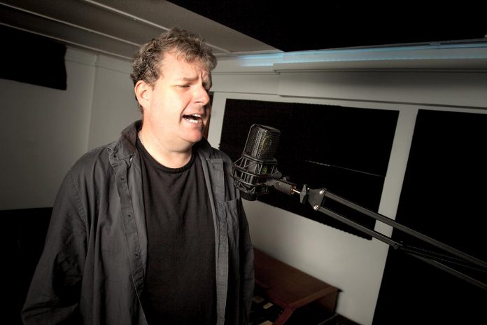 With his voice-over work, Gavin Muir uses his voice for commercials and imaging,  voice acting, and audiobooks and narration. With a professional recording studio in his home, Gavin is able to work from home while also helping to care for his four boys. (Photo: Vicky Paradisis-Gaudreau)