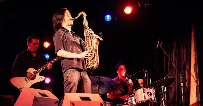 Saxophonist Jonny Wong performing with The 24th Street Wailers. Wong died on October 15, 2021 at the age of 36 following a battle with leukemia. He had recently started a new career as a software developer. (Photo: Blues at the Bow / bluesatthebow.com)
