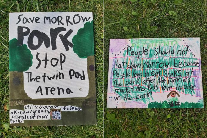 Two signs protesting the planned sports complex at Morrow Park, posted in the "Friends of Morrow" Park Facebook group, co-organized by Braidwood Avenue resident Ruby Rowan. (Photos: Friends of Morrow Park / Facebook)