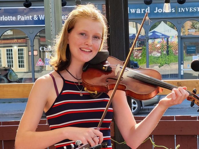 Peterborough fiddling prodigy Irish Millie (Amelia Shadgett), whose debut album "Thirteen" has been nominated for a 2022 Canadian Folk Music Award, performs at the Black Horse in downtown Peterborough on Wednesday, October 27. (Photo: Irish Millie / Facebook)