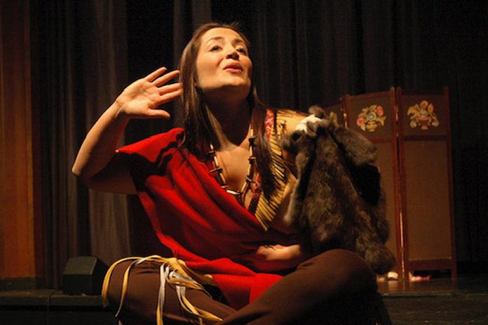 Indigenous actor-singer Cheri Maracle performing "Paddle Song", a one-woman musical about 1800s Mohawk poet Pauline Johnson written for the stage by Dinah Christie. (Photo supplied by Public Energy)