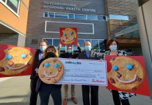 Representatives from Tim Hortons and the Peterborough Regional Health Centre (PRHC) Foundation celebrate raising $68,991.15 through the annual Tim Hortons Smile Cookie campaign to support mental health care services at the hospital. (Photo courtesy of PRHC Foundation)