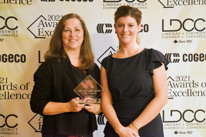 Diane Steven (left), manager of the municipally run Kawartha Lakes Small Business & Entrepreneurship Centre, accepts business Leader of the year award from Johanna Hawkshaw of Cogeco YourTV,  the award's sponsor.  (Photo: R.A. Bloom Creations)