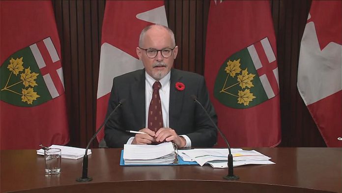 Dr. Kieran Moore, Ontario's chief medical officer of health, announced on November 10, 2021 the government is pausing the lifting of capacity limits on night clubs, strip clubs, and similar settings for 28 days given a recent increase in weekly COVID-19 cases rates in the province. (kawarthaNOW screenshot of CPAC video)