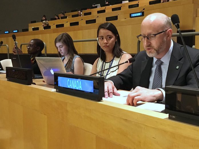 Greg Dempsey speaking in the Economic and Social Council (ECOSOC) Chamber at the United Nations Conference Building in New York City. (Photo: Greg Dempsey / Twitter)