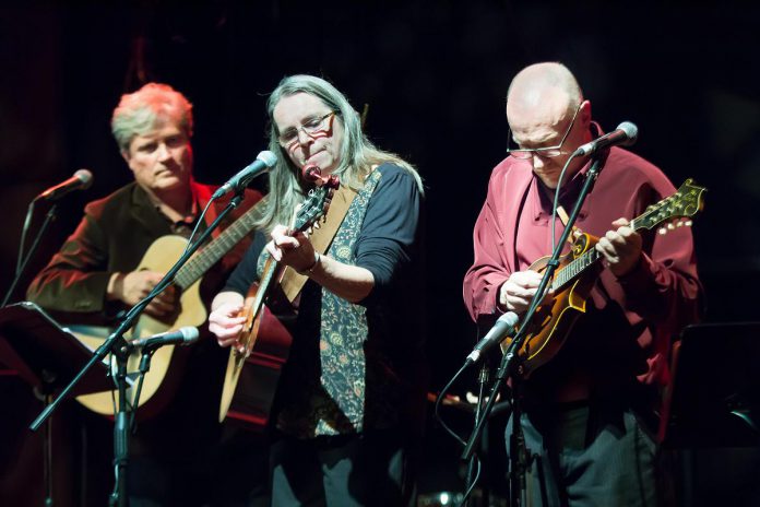 Rob Fortin, Susan Newman, and John Hoffman, who founded the annual In From The Cold Christmas concert in 2000 as a fundraiser for YES Shelter for Youth and Families, will again be performing as Carried Away for the December 11, 2021 performance livestreamed from St. James United Church in Peterborough. The concert also features regulars Curtis Driedger, Michael Ketemer, and Tanah Haney, with special guests the McDonnel Street Gospel Quartet. (Photo: Linda McIlwain / kawarthaNOW)