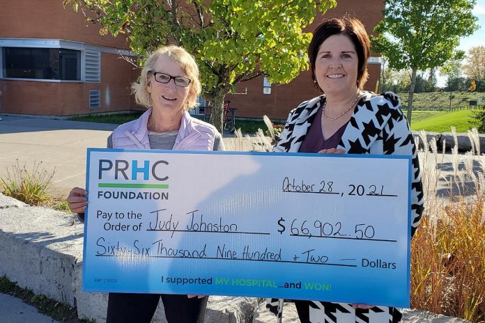 Judy Johnston of Peterborough accepts a cheque for $66,902.50 from Lesley Heighway, president and CEO of the Peterborough Regional Health Centre (PRHC) Foundation, which launched its first-ever 50/50 lottery in September 2021. The 50/50 lottery continues in November. (Photo courtesy of PRHC Foundation)