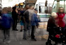 Peterborough Transit passengers at the Simcoe Street bus terminal in downtown Peterborough before the pandemic. (Photo: City of Peterborough)