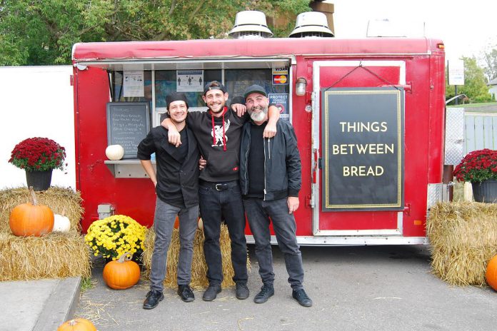 Things Between Bread, a food truck located in the parking lot of Olympus Burger in downtown Port Hope, is the brainchild of Eric Ashley-Harris, Rikki Mckenzie, and Shayne Traviss. Things Between Bread offers fresh made-to-order sandwiches using locally sourced ingredients. (Photo: April Potter / kawarthaNOW)