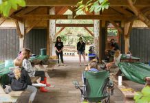 100 Women Peterborough have raised around $8,000 to support Peterborough GreenUP's Girl's Climate Leadership Program in 2022. Pictured are program participants at the Children's Education Shelter in GreenUP's Ecology Park during the summer, where girls girl-identified youth aged 11 to 13 learned the impacts of climate change, developed strategies to support action in their lives, and learned from inspiring local climate leaders who identify as women. (Photo courtesy of Peterborough GreenUP)