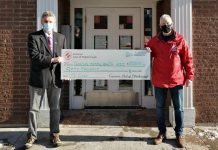 Mark Graham, CEO of the Canadian Mental Health Association Haliburton, Kawartha, Pine Ridge, accepts a $50,000 donation from the Kinsmen Club of Peterborough that will support a new mobile mental health and addictions clinic for the greater Kawarthas region launching in 2022. (Photo courtesy of CMHA HKPR)
