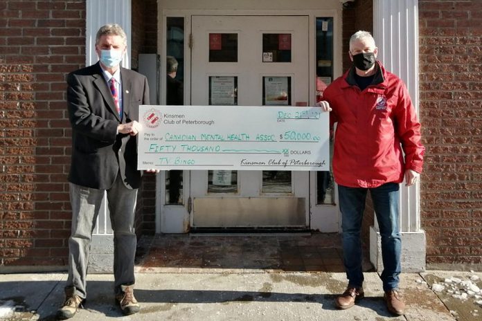 Mark Graham, CEO of the Canadian Mental Health Association Haliburton, Kawartha, Pine Ridge, accepts a $50,000 donation from the Kinsmen Club of Peterborough that will support a new mobile mental health and addictions clinic for the greater Kawarthas region launching in 2022. (Photo courtesy of CMHA HKPR)