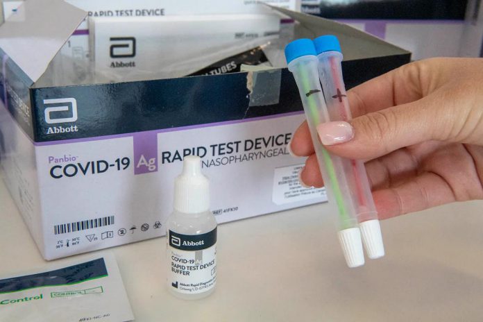 COVID-19 rapid test device kits produced by Abbott are shown at Humber River Hospital in Toronto in 2020. (Photo: Frank Gunn / The Canadian Press)