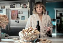 In the satirical thriller "The Woman in the House Across the Street from the Girl in the Window", Kristen Bell stars as a wine-loving heartbroken artist whose life is turned upside down when she thinks she witnesses a crime. The limited series of eight half-hour episodes premieres on Netflix on Friday, January 28, 2022. (Photo: Netflix)