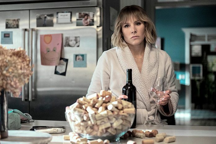 In the satirical thriller "The Woman in the House Across the Street from the Girl in the Window", Kristen Bell stars as a wine-loving heartbroken artist whose life is turned upside down when she thinks she witnesses a crime. The limited series of eight half-hour episodes premieres on Netflix on Friday, January 28, 2022. (Photo: Netflix)