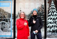 Wild Rock Outfitters staff members Bridget Moore (left) and Rachel Dean celebrating the outdoor retailer's winning holiday window display in the annual contest sponsored by the Peterborough Downtown Business Improvement Area (DBIA). Wild Rock claims a $1,000 prize as the first place winner. Statement House and Green Street came in second and third, winning $500 and $200 respectively. (Photo courtesy of Peterborough DBIA)