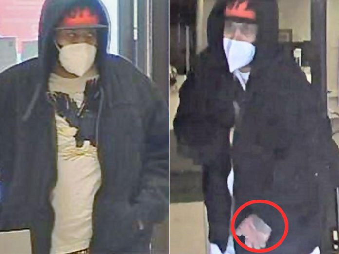 The suspect in an armed robbery of a downtown Peterborough bank on the morning of January 10, 2022. He has a tattoo on the back of his left hand. (Police-supplied photos)