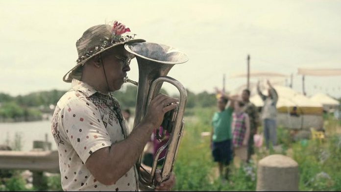 Beau Dixon as the tuba-playing character in the HBO Max limited series "Station Eleven". (kawarthaNOW screenshot)