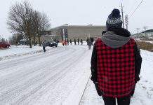 Peterborough-area residents wait outside the Healthy Planet Arena on December 27, 2021 for their COVID-19 booster shots. (Photo: Bruce Head / kawarthaNOW)