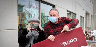 Holiday Shopping Passport grand prize draw winner Arlene Petrany of Peterborough and her grand prize of $1,500 in Boro gift cards with Peterborough DBIA executive director Terry Guiel. (Photo courtesy of Peterborough DBIA)