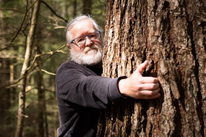 "Conserving Catchacoma" by Toronto-born documentary filmmaker Mitch Bowmile is one of 71 documentaries screening at the virtual 2022 ReFrame Film Festival from January 27 to February 4. The film raises awareness about the largest-known stand of old-growth eastern hemlock in Canada, located in a area of the Kawarthas known as the Catchacoma Forest. Pictured is Dr. Peter Quinby, chief scientist with the Peterborough-based non-profit Ancient Forest Exploration & Research. (Photo courtesy of Mitch Bowmile)