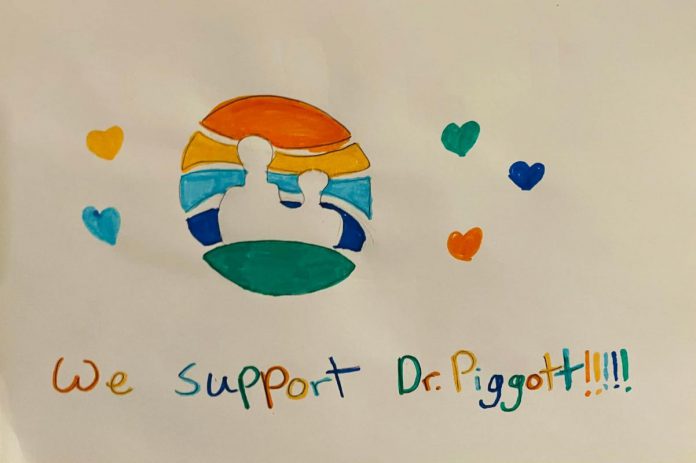 Young Peterborough resident Liv created this artwork showing the Peterborough Public Health logo and a message of support for local medical officer of health Dr. Thomas Piggott, which her father posted in the new 'Nogojiwanong Peterborough Stands With Dr Piggott' Facebook group.