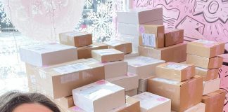 Couture Candy Ptbo owner Lisa Couture with some of the hundreds of online orders she has fulfilled after one of her TikTok videos went viral on February 25, 2022. (Photo: Lisa Couture)