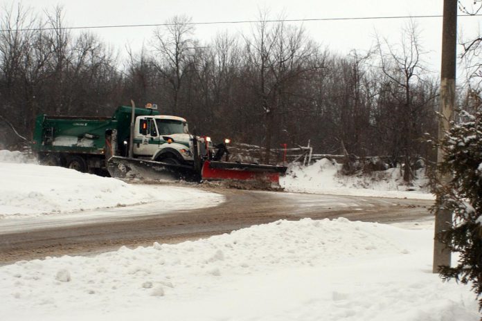 A mixture of salt and sand (called pickle) is often applied to roads to melt ice while improving traction. In the City of Peterborough, snow plows are equipped with computer-controlled application rates for these materials to optimize their use according to set standards. (Photo: Karen Halley)