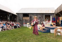 Kate Suhr performs, with Megan Murphy (right) and Saskia Tomkins in the background, during a performance of "The Verandah Society" at 4th Line Theatre in Millbrook in summer 2021. Four songs from the production are now available as a digital EP. (Photo: Tristan Peirce Photography)