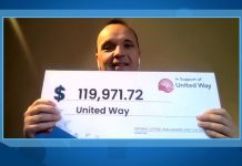 On behalf of 27 United Way locations across Ontario, United Way Greater Toronto president and CEO Daniele Zanotti accepts a donation of almost $120,000 from OLG during a virtual cheque presentation. (kawarthaNOW screenshot)