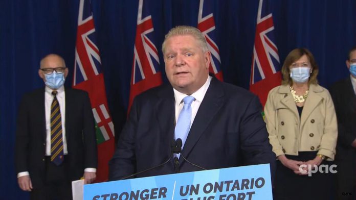 Ontario premier Doug Ford announcing the easing of COVID-19 public health restrictions at a media conference at Queen's Park in Toronto on February 14, 2022. (kawarthaNOW screenshot of CPAC video)