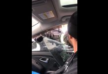 Peterborough police smashed a vehicle window to arrest local anti-lockdown and anti-vaccine mandate advocate Tyler Berry on February 26, 2022. (kawarthaNOW screenshot of Facebook video)