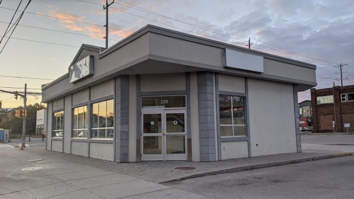 Peterborough's Opioid Response Hub is located in the former Greyhound bus terminal at Simcoe and Aylmer streets in downtown Peterborough, pictured here in October 2020 when the application for provincial approval of a Consumption and Treatment Site at the location was made. (Photo: Bruce Head / kawarthaNOW)