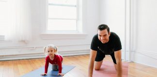 Mike Dalliday, pictured with his daughter Rachel, has stepped away from his health care career to become the CEO of his late wife's successful business Pilates on Demand, launching a completely redesigned website with upgraded features for members. (Photo courtesy of Mike Dalliday)