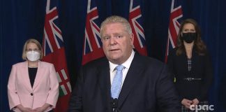 Ontario Premier Doug Ford declares a state of emergency, in response to protestors occupying the city of Ottawa and blockading the border crossing in Windsor, at a media conference at Queen's Park in Toronto on February 11, 2022. (kawarthaNOW screenshot of CPAC video)