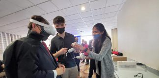 During a media event in Peterborough on February 25, 2022, Ontario minister for seniors and accessibility Raymond Cho (left) tries out the Council for Persons with Disabilities' virtual reality component of the organization's Time in My Shoes experiential program that emulates what it is like to have a disability. (Photo: Ontario Ministry for Seniors and Accessibility)