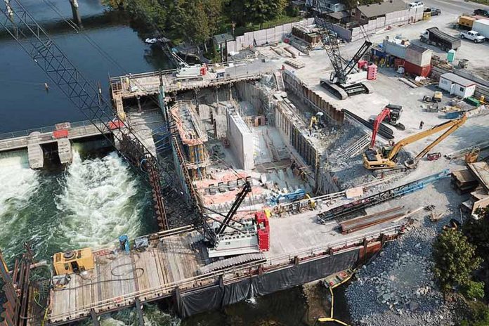 Construction on Scotts Mills Dam on the Otonabee River, adjacent to River Road South, in summer 2020. The project will be entering its third year of construction in spring 2022. (Photo: Parks Canada)