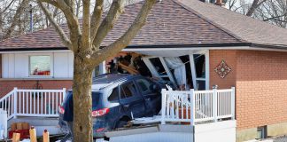 A home on Fairbairn Street was extensively damaged after a car drove into it following a collision with a taxi van on March 21, 2022. (Photo: Brian Papypra)
