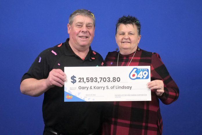 Gary and Karry Stata of Lindsay with their $21,593,703.80 Lotto 6/49 grand prize. (Photo: OLG)