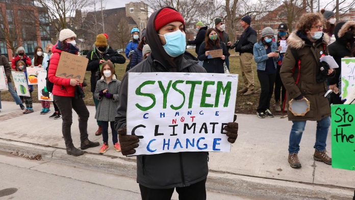 Some of the demands of the Youth Climate Action Club of Peterborough-Nogojiwanong include halting new fossil fuel projects or pipelines and transitioning away from fossil fuels to renewable energy. (Photo: Sean Bruce)