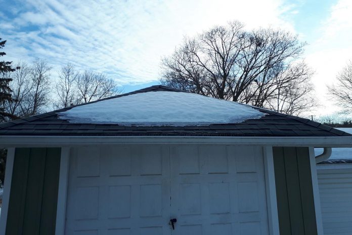 Snow that accumulates on your roof will become harmful stormwater run-off unless it is directed onto a soft surface. (Photo: Hayley Goodchild, CC-BY 2.0)